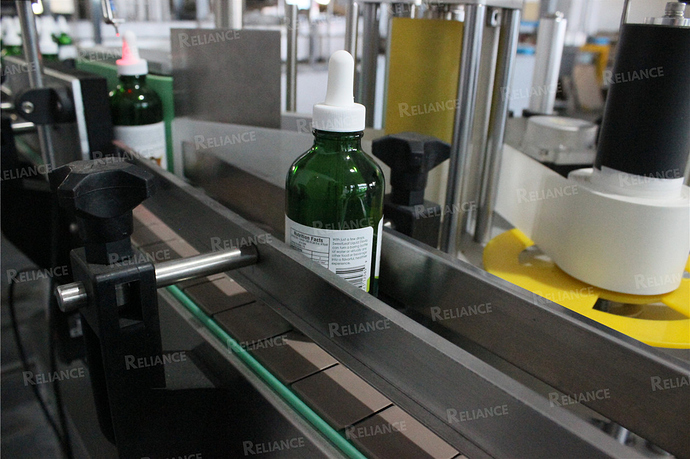 CBD oil dropper bottle labeling machine RELIANCE05