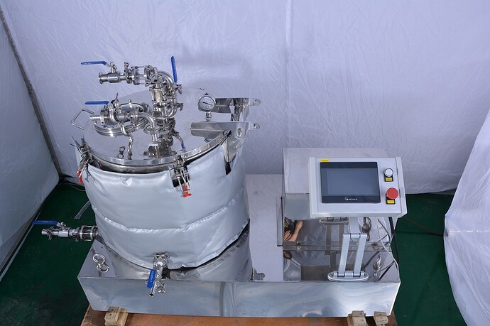 Jacketed centrifugal extractor